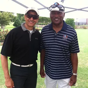 Charles with Cowboys great