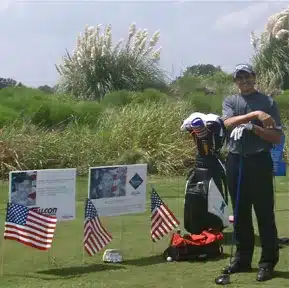 Charles Kallassy leading a golf exhibition honoring fallen service members