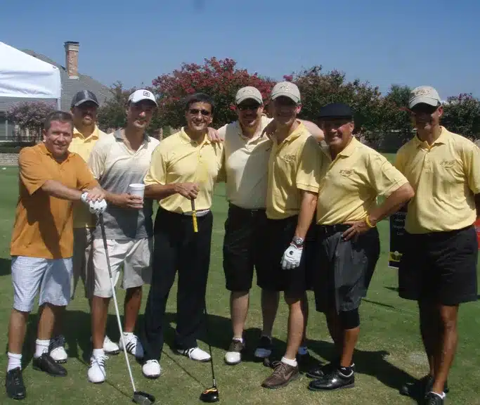 Charles Kallassy leading a charity long-drive exhibition