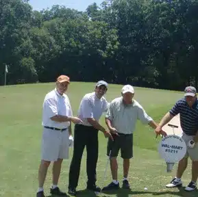 Charles Kallassy with three witnesses after a 486-yard drive