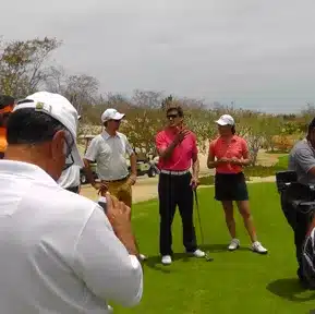Charles Kallassy in a golf exhibition with Lorena Ochoa in Cabo San Lucas