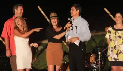 Charles Kallassy emceeing with Lorena Ochoa at the Lorena Ochoa Foundation Celebrity Golf Tournament in Cabo San Lucas